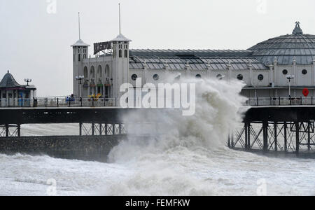 Brighton, UK. 8th February, 2016. UK Weather: Huge waves break over Brighton seafront at high tide by the pier as Storm Imogen batters the south coast today with the weather forecast predicting wind speeds of up to 90 mph causing widespread flooding and damage  Credit:  Simon Dack/Alamy Live News Stock Photo