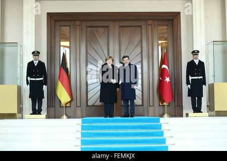 Ankara. 8th Feb, 2016. Turkish Prime Minister Ahmet Davutoglu (R Center) welcomes German Chancellor Angela Merkel with an official ceremony at the Cankaya Palace in Ankara, Feb. 8, 2016. Credit:  Mustafa Kaya/Xinhua/Alamy Live News Stock Photo