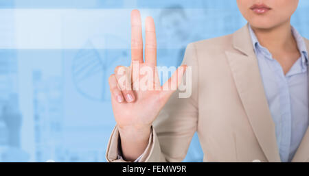 Composite image of businesswoman touching Stock Photo