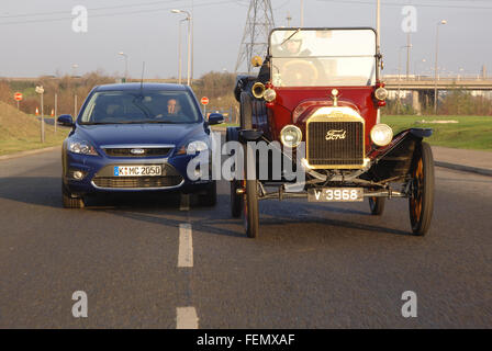 Model T Ford and 2007 Ford Focus, original and current cars from Frod Stock Photo