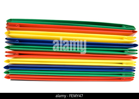 Stack of Vibrantly Colored Plastic File Folders Stock Photo