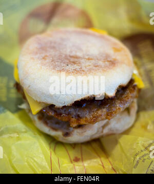 A McDonald's Sausage McMuffin with Egg breakfast sandwich. Stock Photo