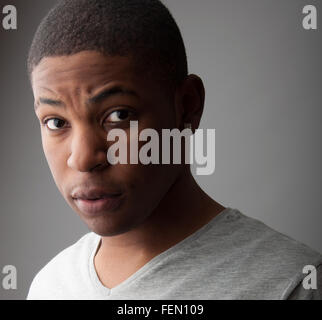 Close up Headshot portrait of a handsome black man. Stock Photo