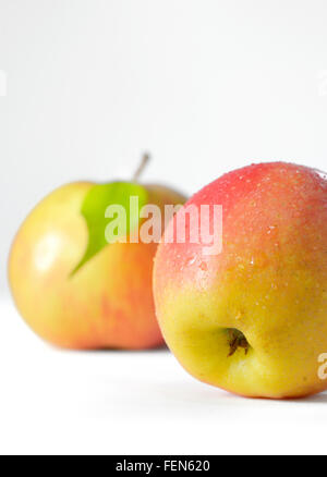 Ripe apples fruit with leaves and water drops Stock Photo
