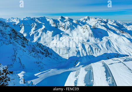 Scenery from the cabin ski lift at the snowy slopes (Tyrol, Austria). All skiers are unrecognized. Stock Photo