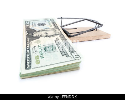 Mouse trap with 20 dollar bill pile attached as bait on whiite background Stock Photo
