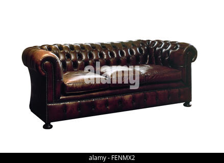 Old fashioned brown leather sofa on white with clipping path Stock Photo