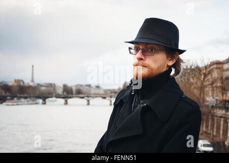 Handsome Calm Bearded Man Wearing Hat in Paris, France, Looking in Camera. Headshot Composition. Stock Photo