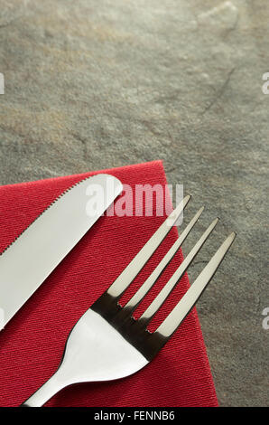 knife and fork on napkin cloth Stock Photo