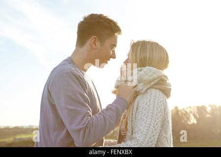 Romantic young couple on date at beach Stock Photo