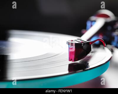 Close up of a vinyl record and stylus on turntable Stock Photo