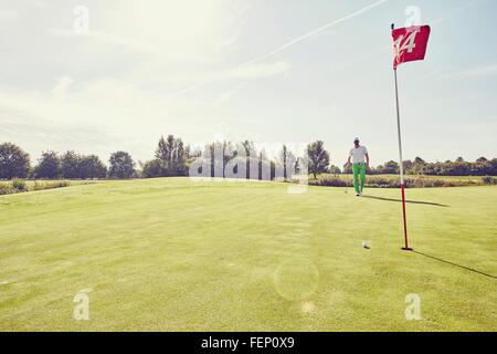 Golfer playing golf, near 14th hole, Korschenbroich, Dusseldorf, Germany Stock Photo