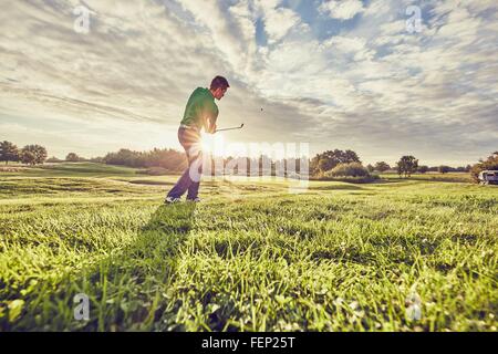 Golfer playing golf on course, Korschenbroich, Dusseldorf, Germany Stock Photo