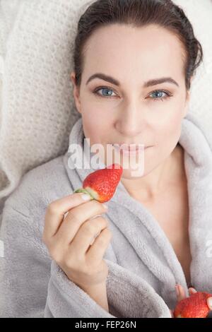 Woman Eating Strawberries Stock Photo - Alamy