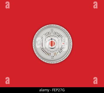 Smoke alarm with red button on red background Stock Photo