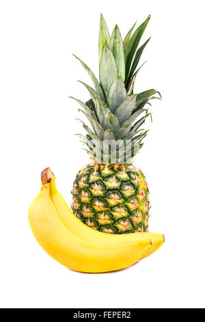 Fresh fruits bananas and pineapple isolated on white background Stock Photo