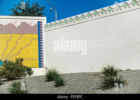 part of vivid red yellow blue abstract tile mural suggesting mountain desert motif on Interstate 10 overpass underpass Arizona Stock Photo