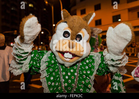 Characters, dancers and floats at the opening parade of the Carnaval de Santa Cruz de Tenerife. Thousands of people in groups of Stock Photo