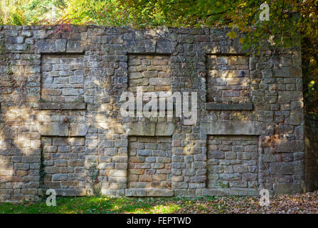 Wall at Lumsdale near Matlock in Derbyshire Peak District England UK where early industrial buildings were powered by water Stock Photo