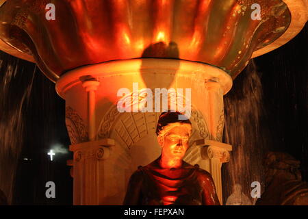 Fountain in skopje with the Millennium Cross in the background Stock Photo