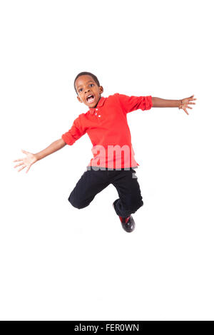 Portrait of a cute african american little boy jumping, isolated on white background Stock Photo