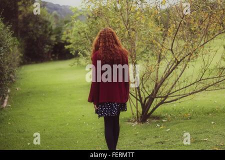 Rear View Of Woman In Park