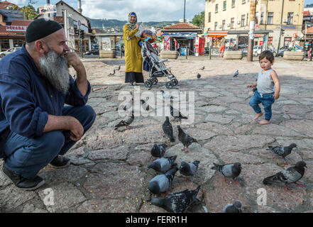 family at main square of Bascarsija historical district in Sarajevo, Bosnia and Herzegovina Stock Photo