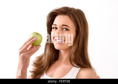 Young caucasian woman with apple Stock Photo