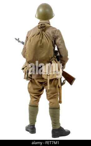 a young Soviet soldier with rifle, back view, on the white background Stock Photo