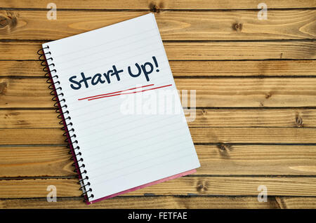 Start up word written on notebook page Stock Photo