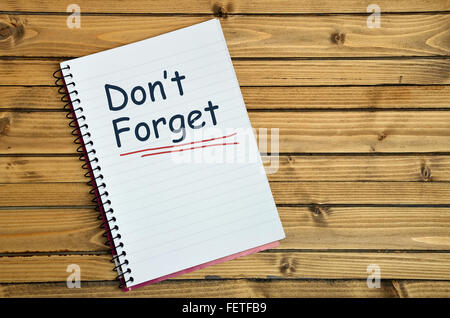 Don't forget word writing on notebook Stock Photo