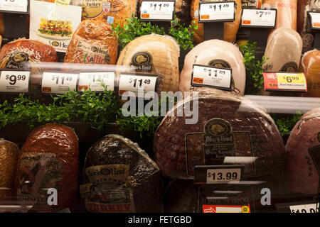 Meats in deli counter at supermarket in Massachusetts. Stock Photo