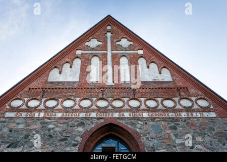 The Church of St. Lawrence roof gable with the text of Psalms 84:10 in Vantaa, Finland Stock Photo