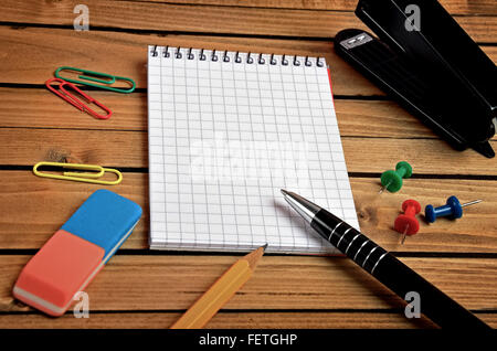 Notebook and office supply on table Stock Photo