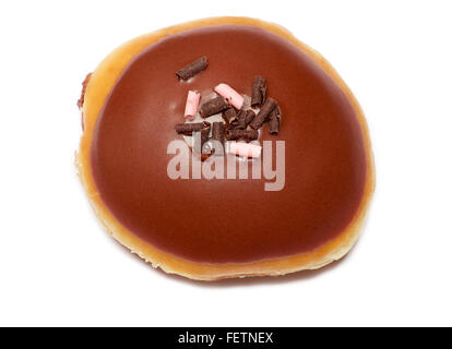 Isolated chocolate glazed donut with chocolate chips on top Stock Photo