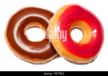 Two isolated red and chocolate doughnuts over white Stock Photo