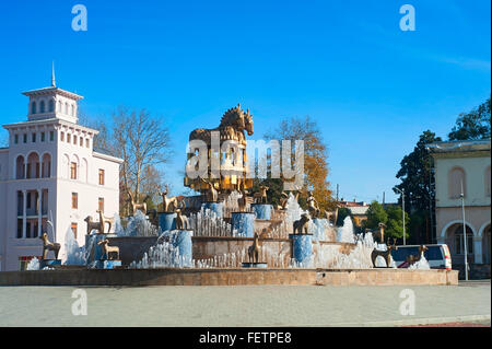 Fountain on central square in Kutaisi, Georgia,capital of antique Colhis. Fountain shows 30 golden statues of the Colchis Stock Photo