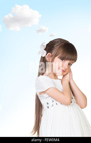 Beautiful smiling girl dreaming Stock Photo