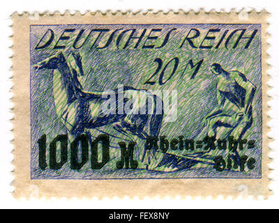 GOMEL,BELARUS - FEBRUARY 2016: A stamp printed in Germany shows image of the Germany husbandman, circa 1930. Stock Photo