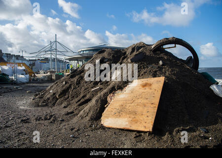 Aberystwyth Wales UK, Tuesday 09 February 2016 UK weather: The process of cleaning up the damage caused by Storm Imogen when it hit Aberystwyth begins. Parts of the promenade are still closed to traffic because of the tons of beach sand deposited by the waves photo Credit:  keith morris/Alamy Live News Stock Photo
