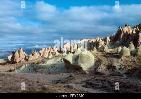 Dramatic Landscape of Weathered Volcanic Tufa Rock, Rock Pinnacles, Hoodoos or Fairy Chimneys, in Devrent Valley or Red Valley, Cappadocia Turkey Stock Photo