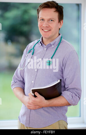 Portrait of Doctor holding files Stock Photo