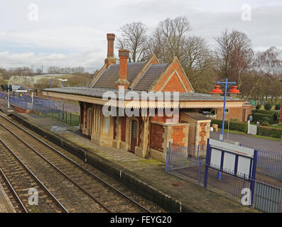 Culham preserved railway station building made of red brick and sandstone with a large wooden canopy alongside the mail line Stock Photo