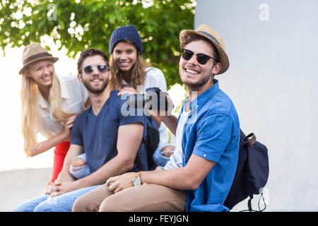 Hip friends taking pictures Stock Photo