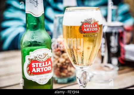 Stella Artois glass and bottle beer in a San Miguel de Allende Restaurant, Mexico Stock Photo