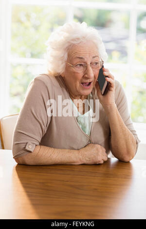 Elderly woman phone calling Stock Photo