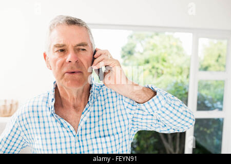Senior man on a phone call Stock Photo