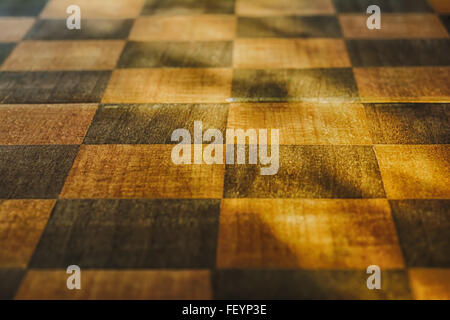 Old grunge wooden chess board. Geometric texture Stock Photo