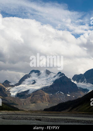 View of the snowfield just to the south of Athabasca Glacer with the Sunwapta River in the foreground, along Icefields Parkway. Stock Photo