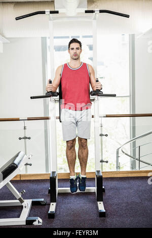 Muscular man doing pull up Stock Photo